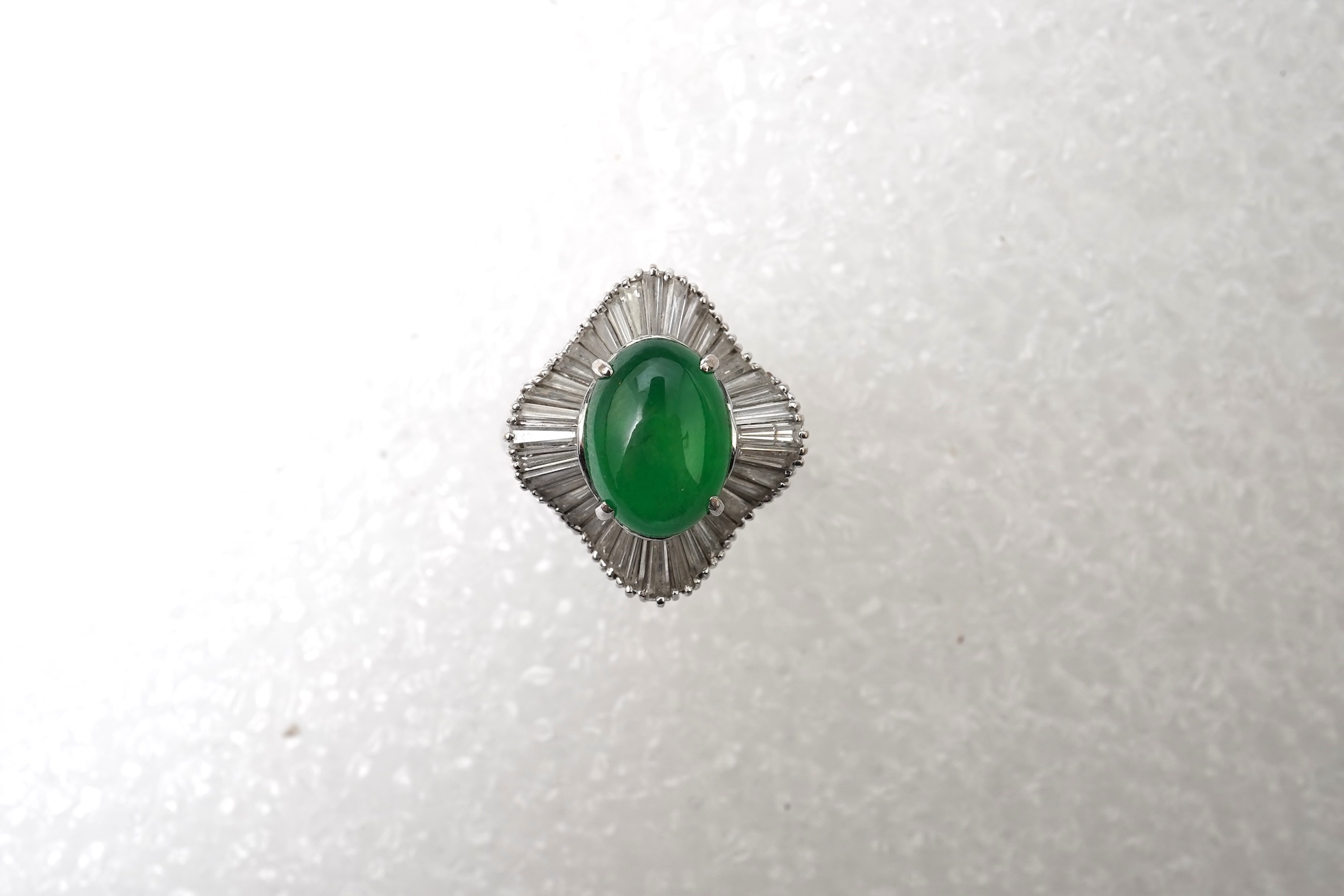 A fine jadeite and diamond ring